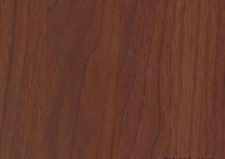 Caramel Walnut PVC film surface — wood-grain close-up swatch